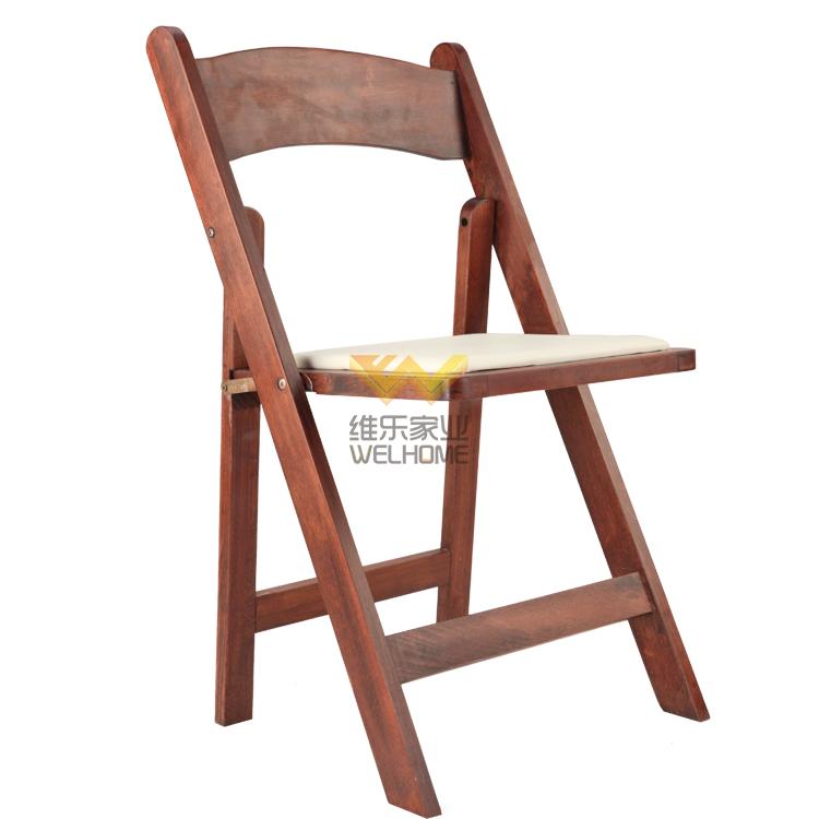 Brown wooden folding chair for wedding/event